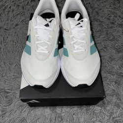 Size 8, men’s brand new unworn Adidas shoes with tags and box