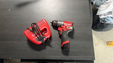 Milwaukee M12 Drill Battery And Charger