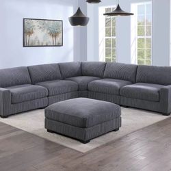 GREY OR IVORY CORDUROY SECTIONAL WITH OTTOMAN