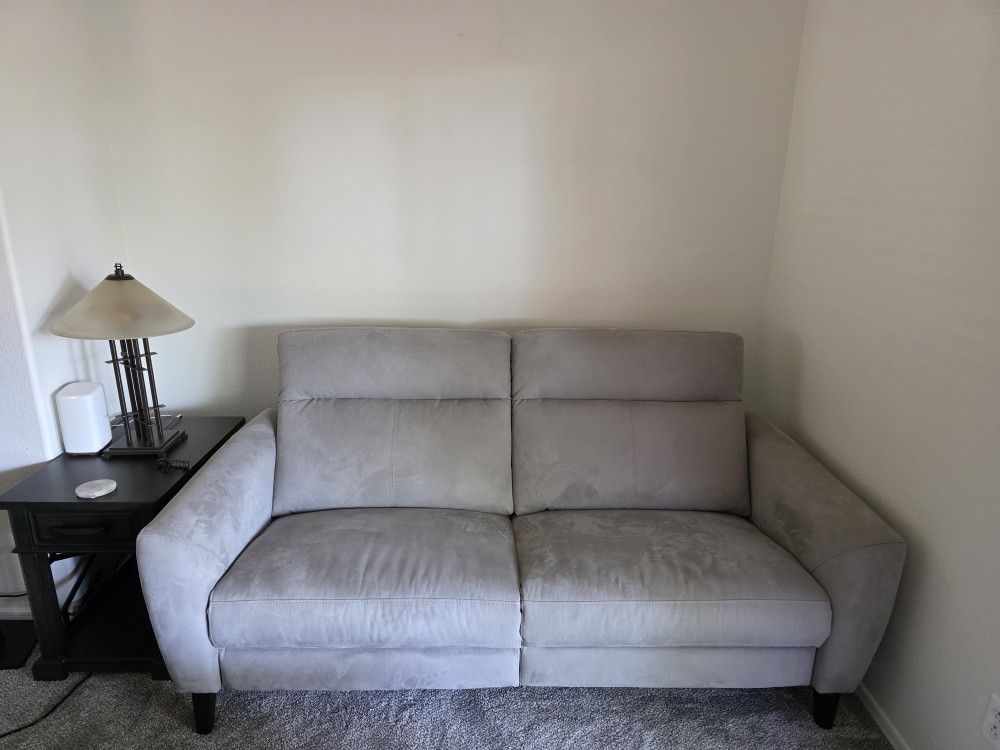 1 Love Seat chair/sofa that reclines with 2 chairs.