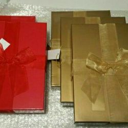 NEW GIFT BOXES WITH BOWS 
2 RED 
3 GOLD