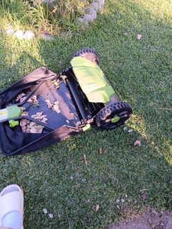 Hand pushed lawn mower