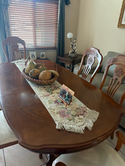 Dining room table, chairs and corner cabinet
