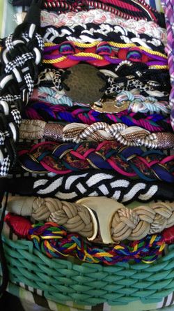 Collection tion of 16 fancy ornate woven fabric