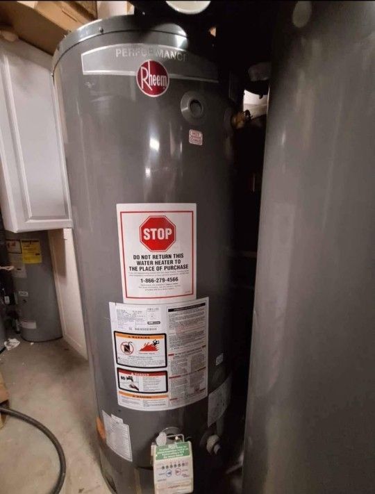 water heater Rheem gas Natural 75 gallons .open box item with dents and scratches NEW NEVER INSTALLED BEFORE MFG YEAR 2019