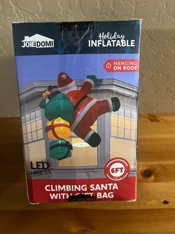 Inflatable climbing Santa with gift bag