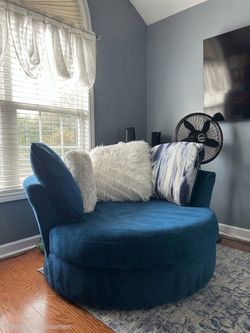 Beautiful Blue round lounge, swivel chair $250