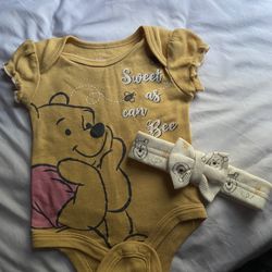 Winnie the pooh with bow