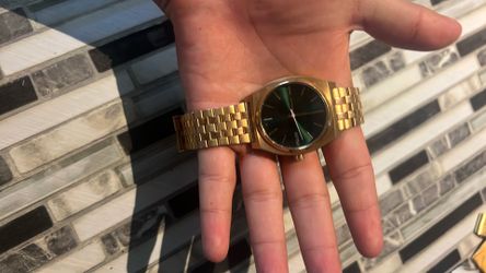 Gold Nixon Watch