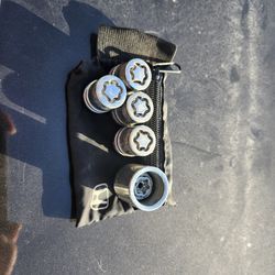 OEM Honda wheel lock set with pouch