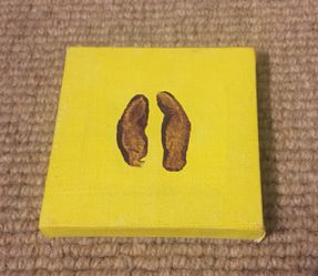 San Diego Zoo Black duiker hoofprint on yellow canvas