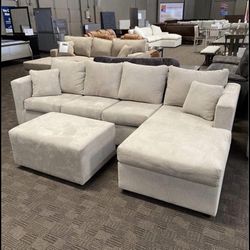 New Grey Sectional And Ottoman 