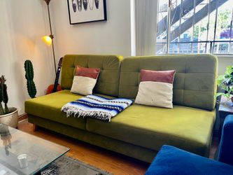 Green couch / love seat / convertible futon bed (storage underneath)