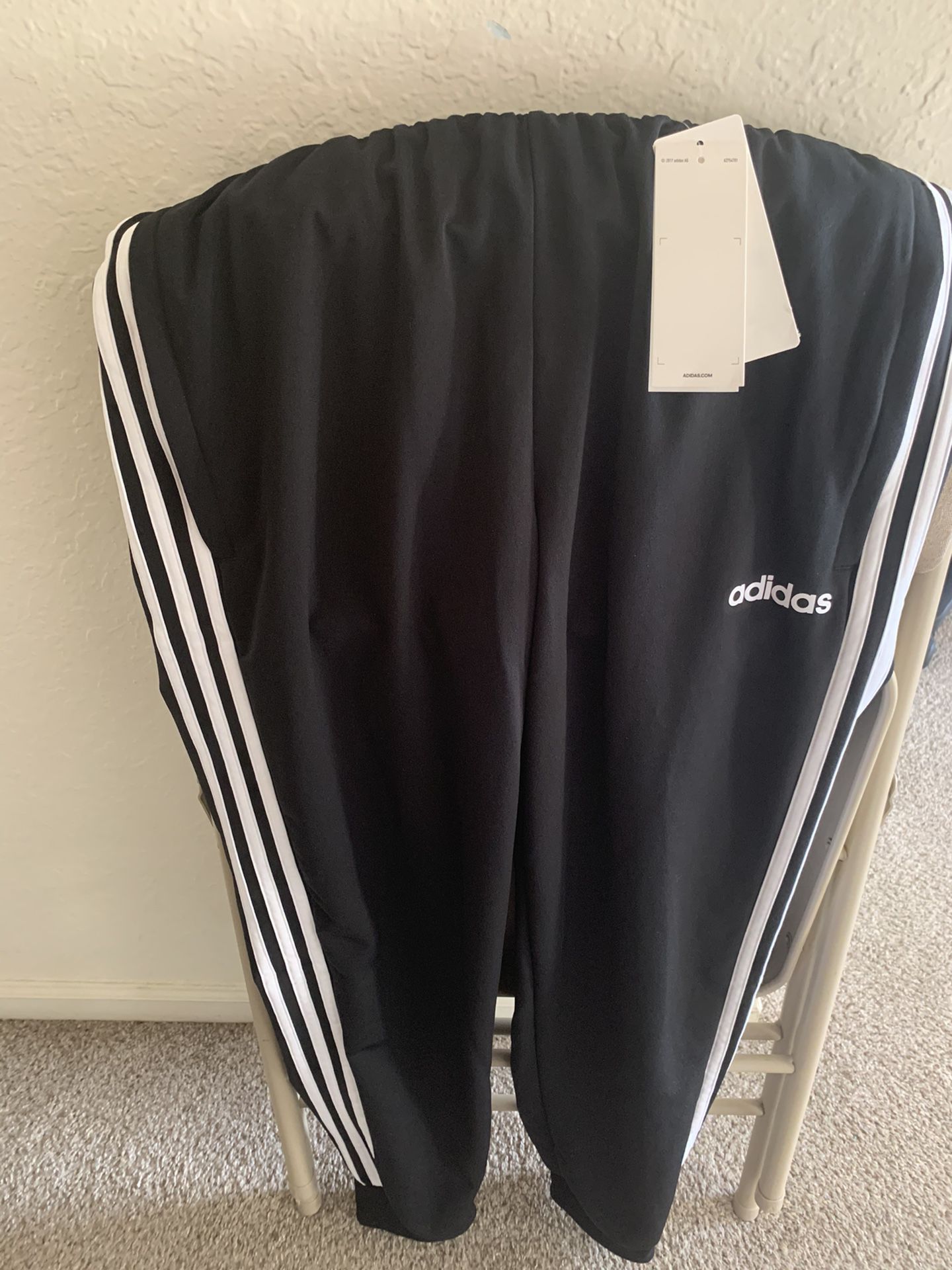Brand new adidas pants size M color black never used