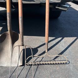 Antique Shovel, pitchfork , and hard rake