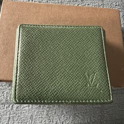 LV taiga Leather coin pouch 