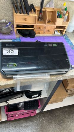 FoodSaver FM2100 or FM2000 series vacuum sealer.