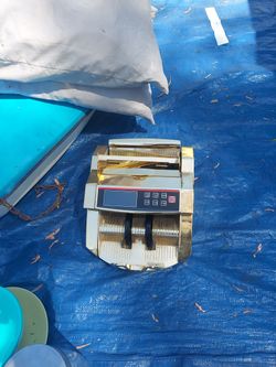 MONEY COUNTING MACHINE & COUNTERFEIT BILL DETECTOR