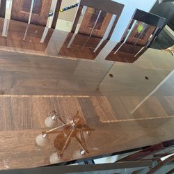 Brown Veneer Dining Table