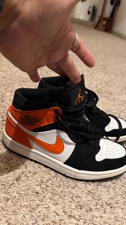 Air Jordan 1 Mid Black Orange White Sneakers