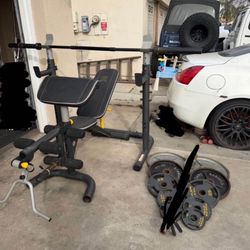 Bench press/squat rack with 7ft bar plus 240lbs total