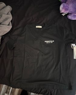 Black Essential tee with white lettering size medium