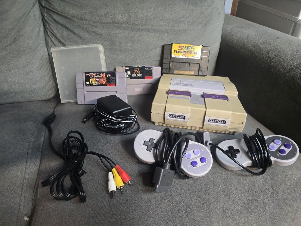 SNES super Nintendo console with 2 controller and Over 100 Games