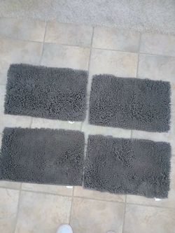 4 throw rugs (they trap dirt from coming in house) Freshly Laundered