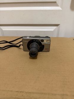 Canon Sure Shot 105 Zoom 35mm Point & Shoot Film Camera Case New Battery WORKS Used in good with some cosmetic blemishes. These blemishes are in the