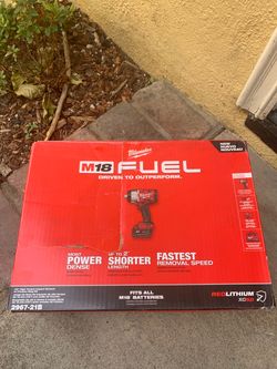 Milwaukee m18 fuel 1/2 high torque impact wrench with 5.0 battery and charger new