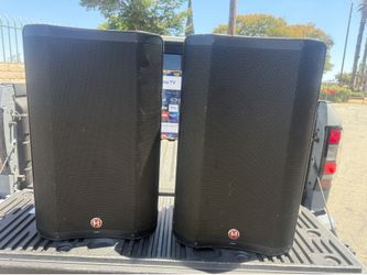 Harbinger speaker pair , with speakers stands and carrying case..