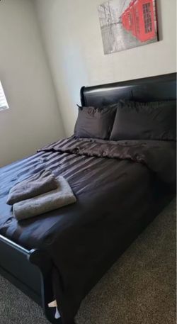 Queen Black Sleigh Bed Frame with mattress