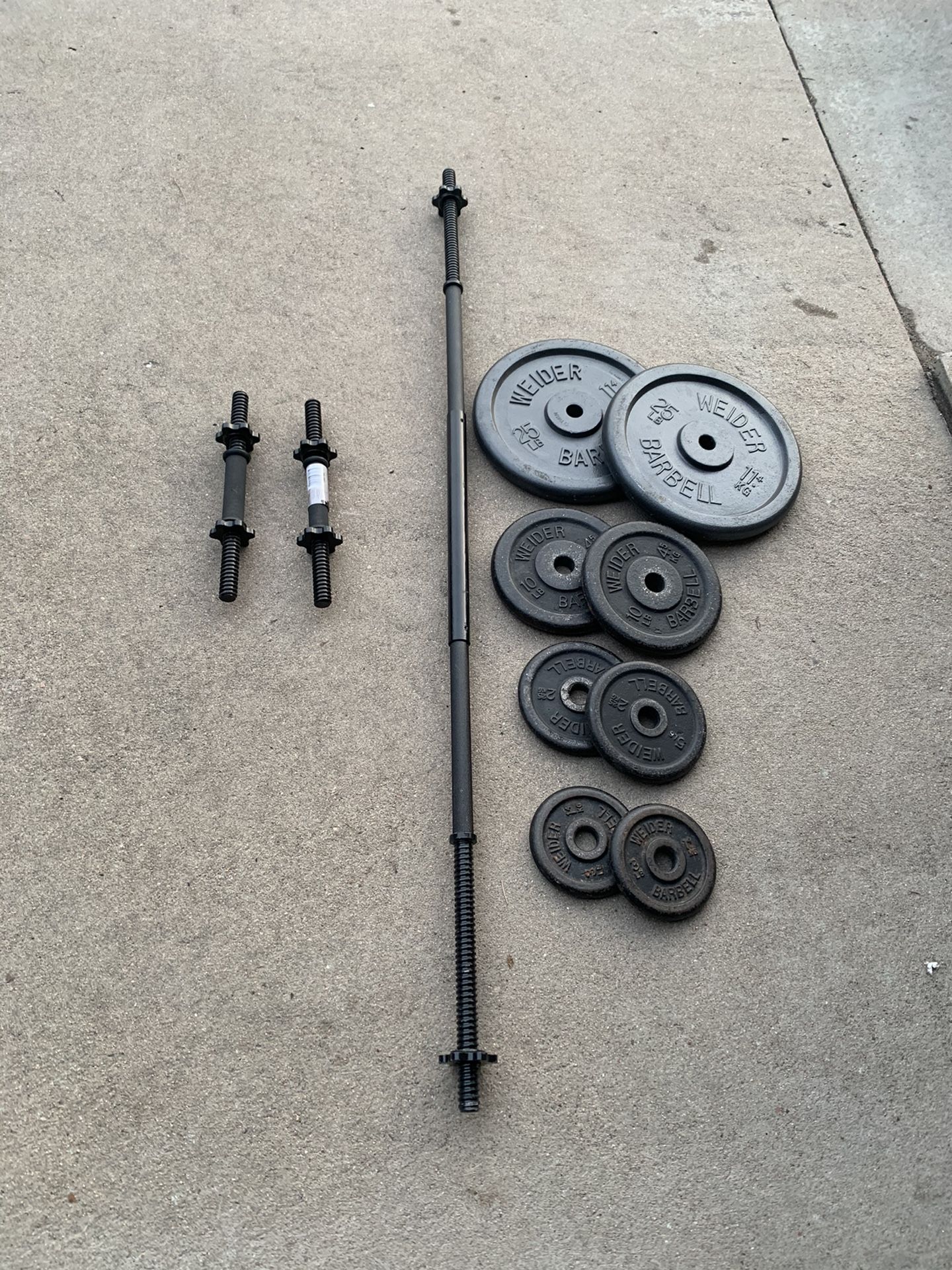 85lb Weight plates 1” hole, 5 ft Barbell and 2 dumbbell handles