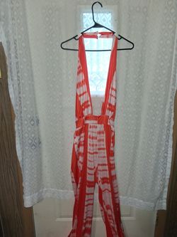 Vibrant orange and white tir-dyed wide-leg jumpsuit
