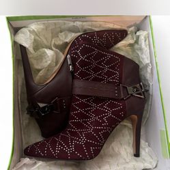 Burgundy suede embellished ankle heeled boots with pointed toe.