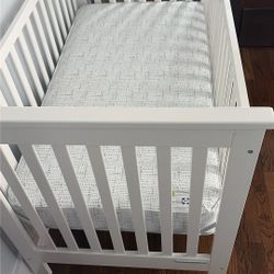 Sealy Cozy Rest 2-Stage Extra Firm Crib and Toddler Mattress: Hypoallergenic, Waterproof Cover, Innerspring, 5.25" Thickness