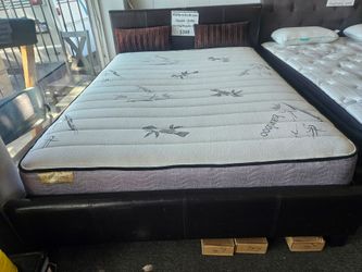 Brand new black faux leather king or CA king platform bedframe + 10" thick soft innerspring mattress