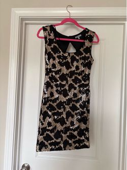 Black and gold sequin dress