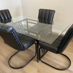 Glass Top Table & 4 Black Leather Chairs