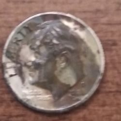 1996 D Dime.  Missing most of the Clad Layer.