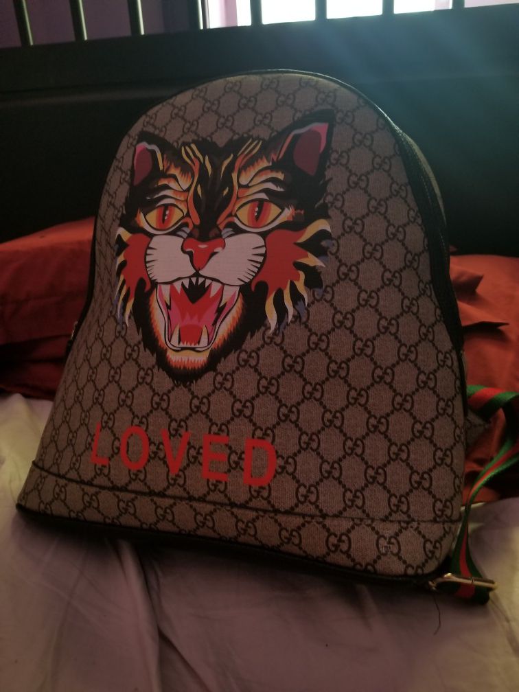 gucci angry cat supreme GG backpack