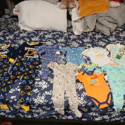 Brand new baby boy sleepers  and onesie size 3/6 or 0/3 and 6/9