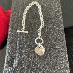 Sterling Silver Heart And Cross Bracelet. 