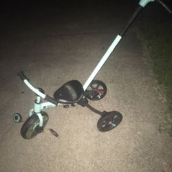 Lnew  Toddlers tricycle with a dirt steering handle very nice only $35