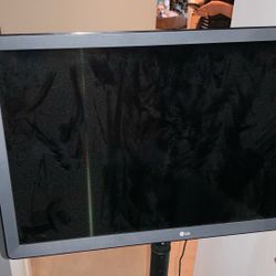 LG   24” Tv With Remote On Stand