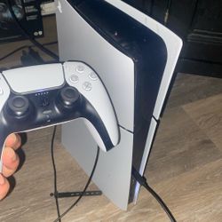 ps5 slim  with 2 controllers 