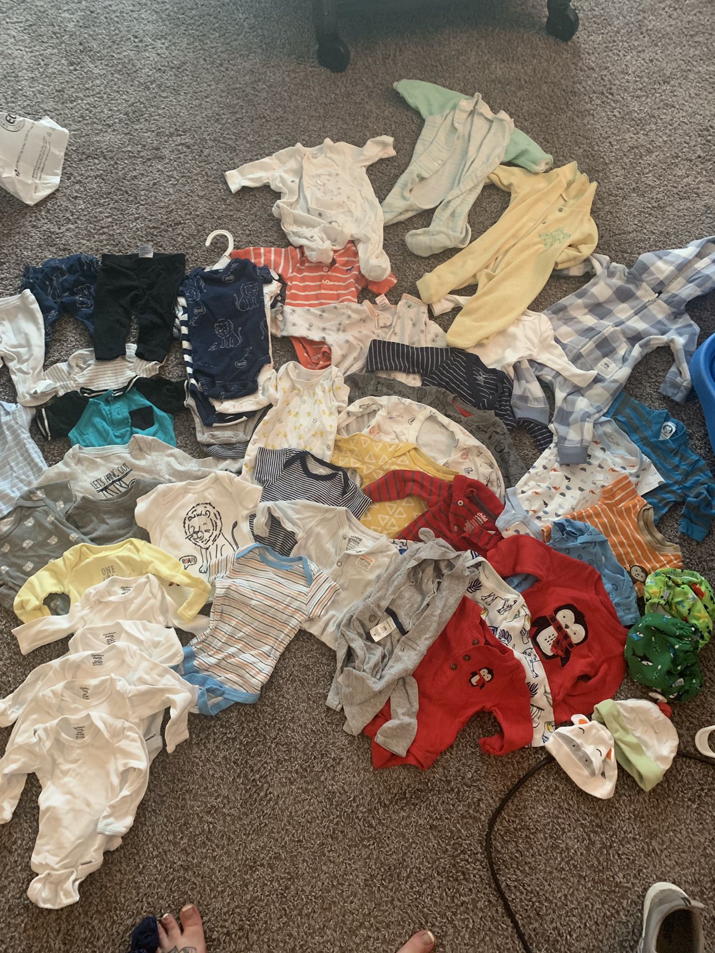 Brand new baby clothes and diapers lot