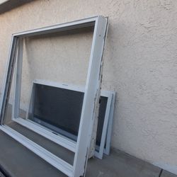 Qty. 2 - 6 ft. Wide vinyl sliders.