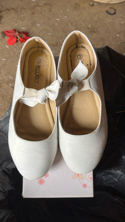 Zapatos de niña color blanco del número tres