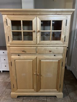 Lightwood Cabinet With Two Glass Shelves That Light Up